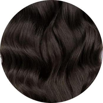 Close-up of dark brown hair on a white background