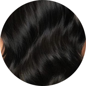 Close-up of black hair with a circular border