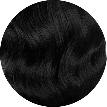 Close-up of black hair on a white background