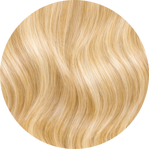 Close-up of blonde hair extension color swatch on a white background