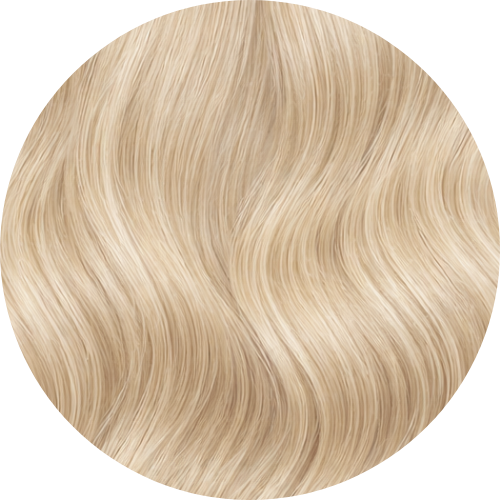 Close-up of blonde hair with a white background