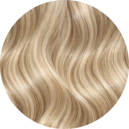 Close-up of wavy blonde hair on a white background