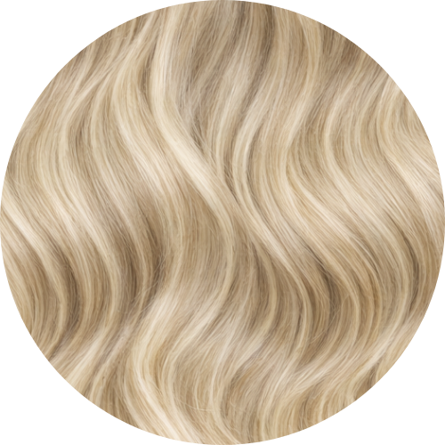 Close-up of wavy blonde hair extension swatch on a white background