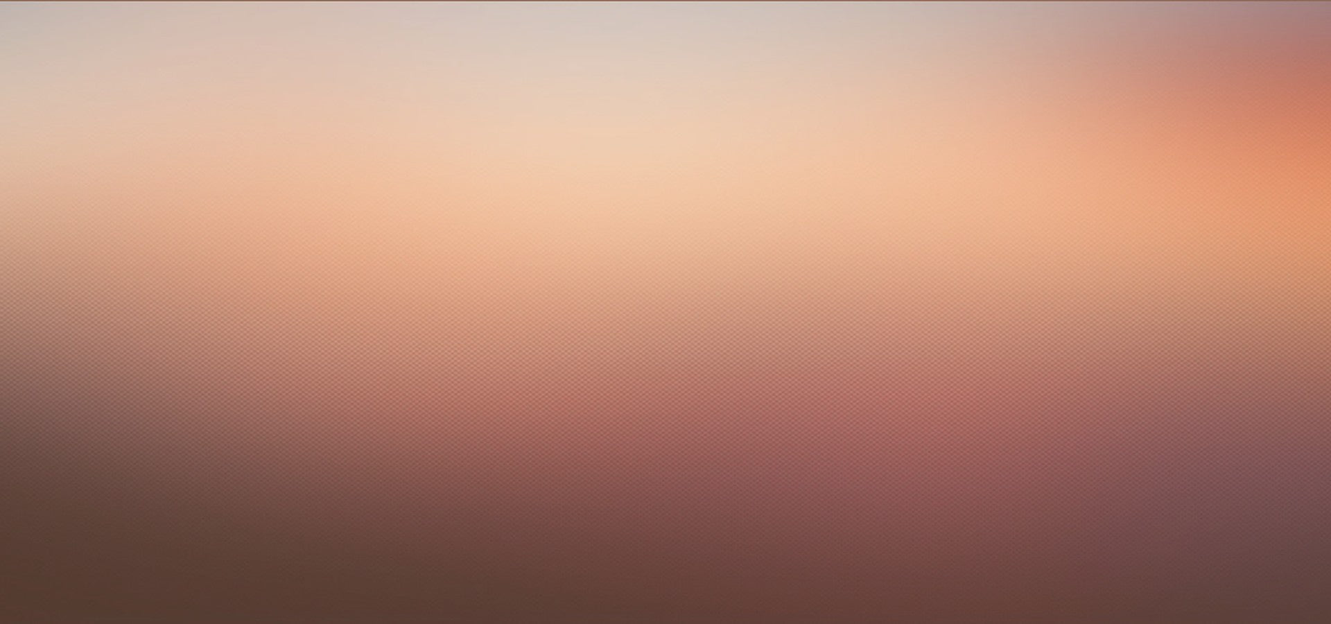 Gradient background transitioning from light brown to orange