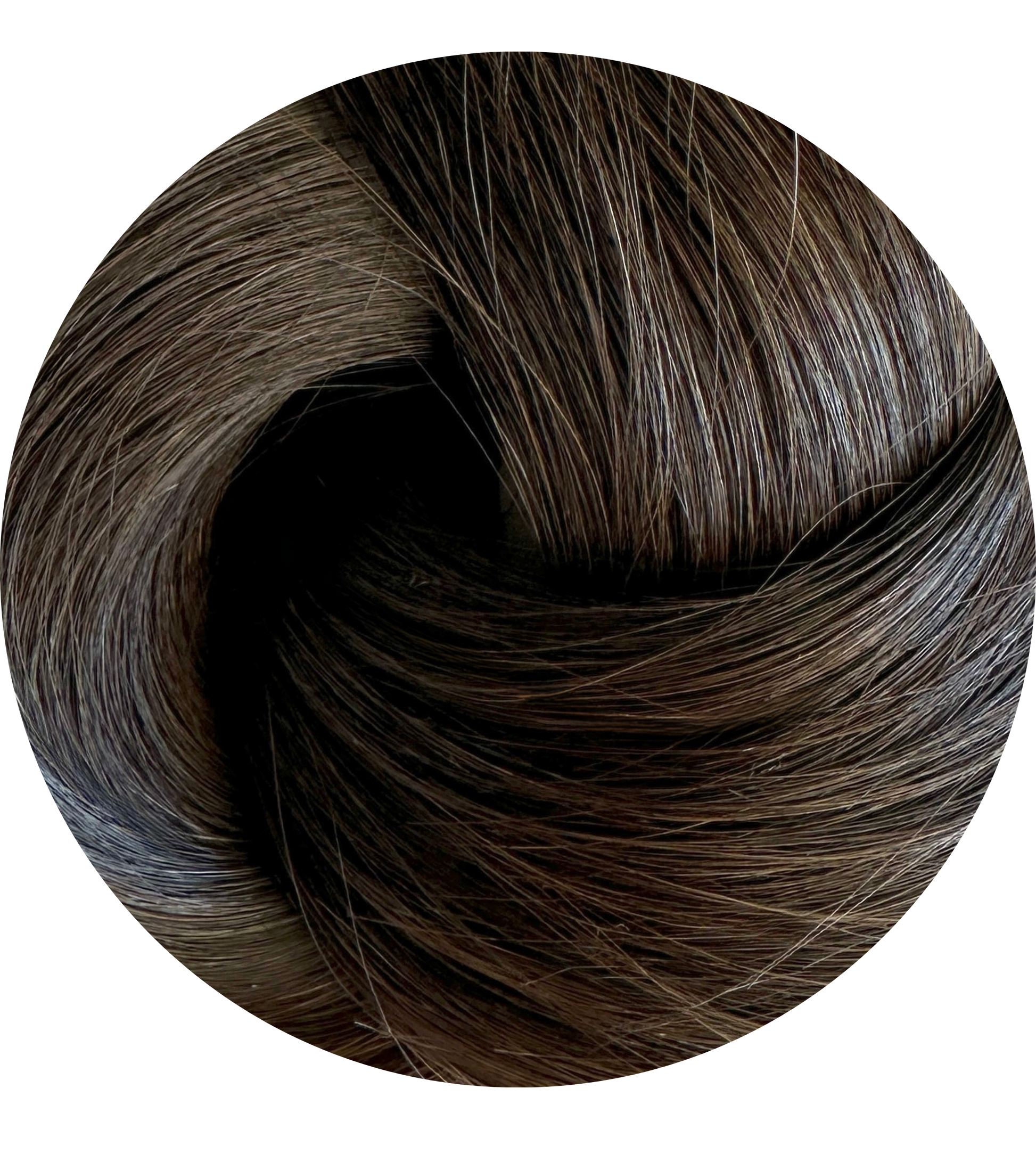 Close-up of brown hair extension swatch with a white background