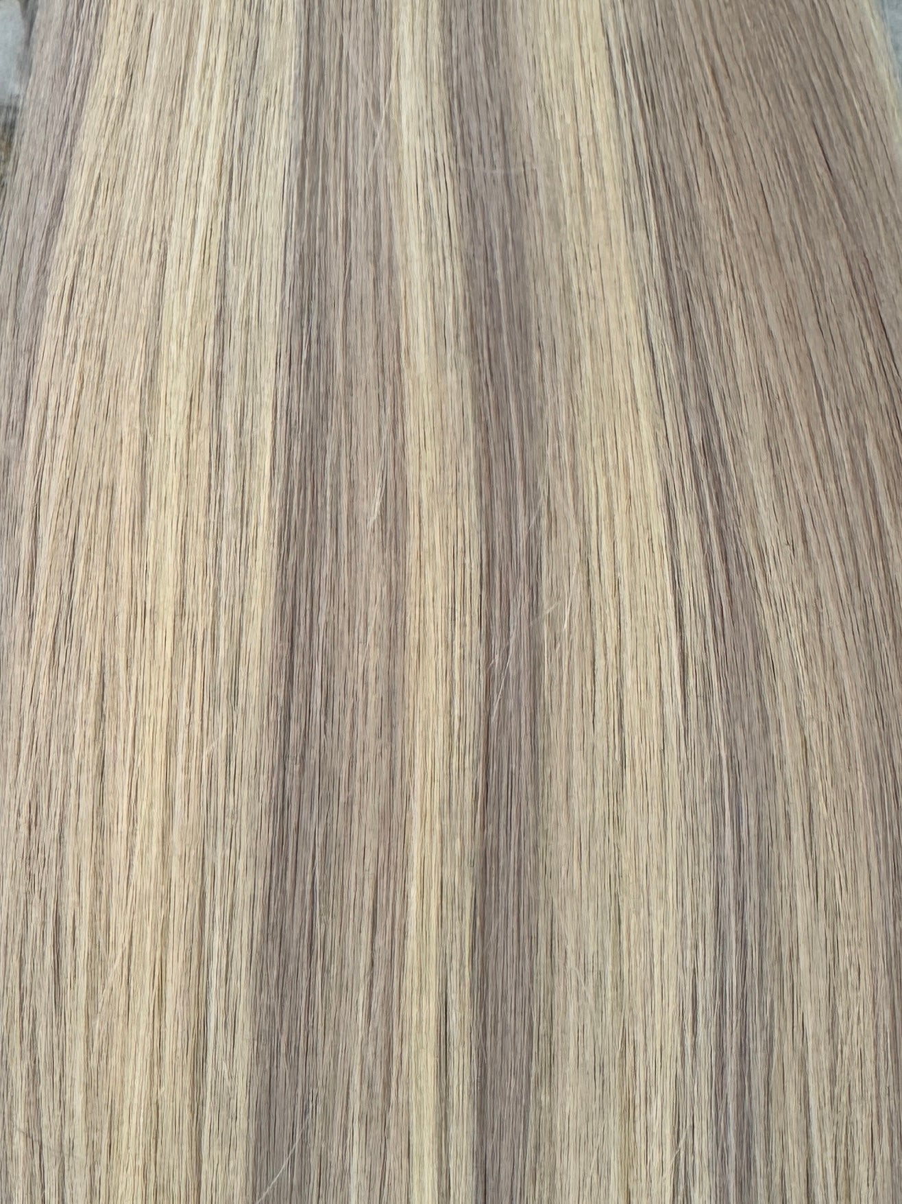 Close-up of hair extensions with a striped pattern