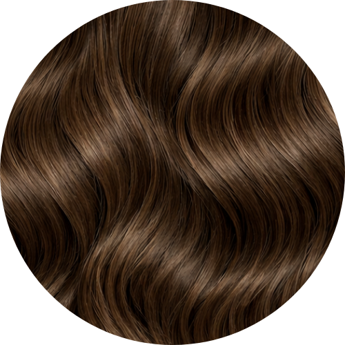 Close-up of wavy brown hair on a white background
